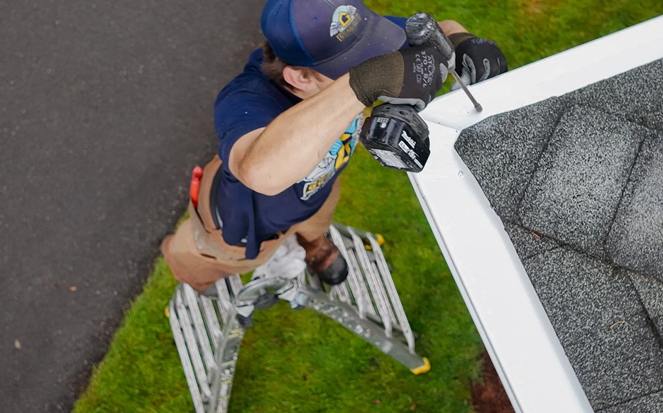 Roofer working