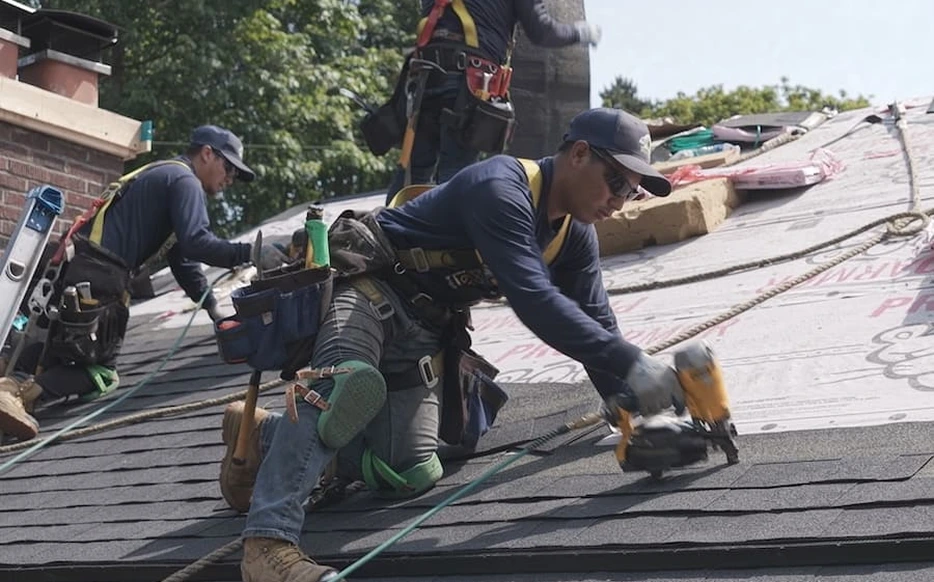 Roofer working